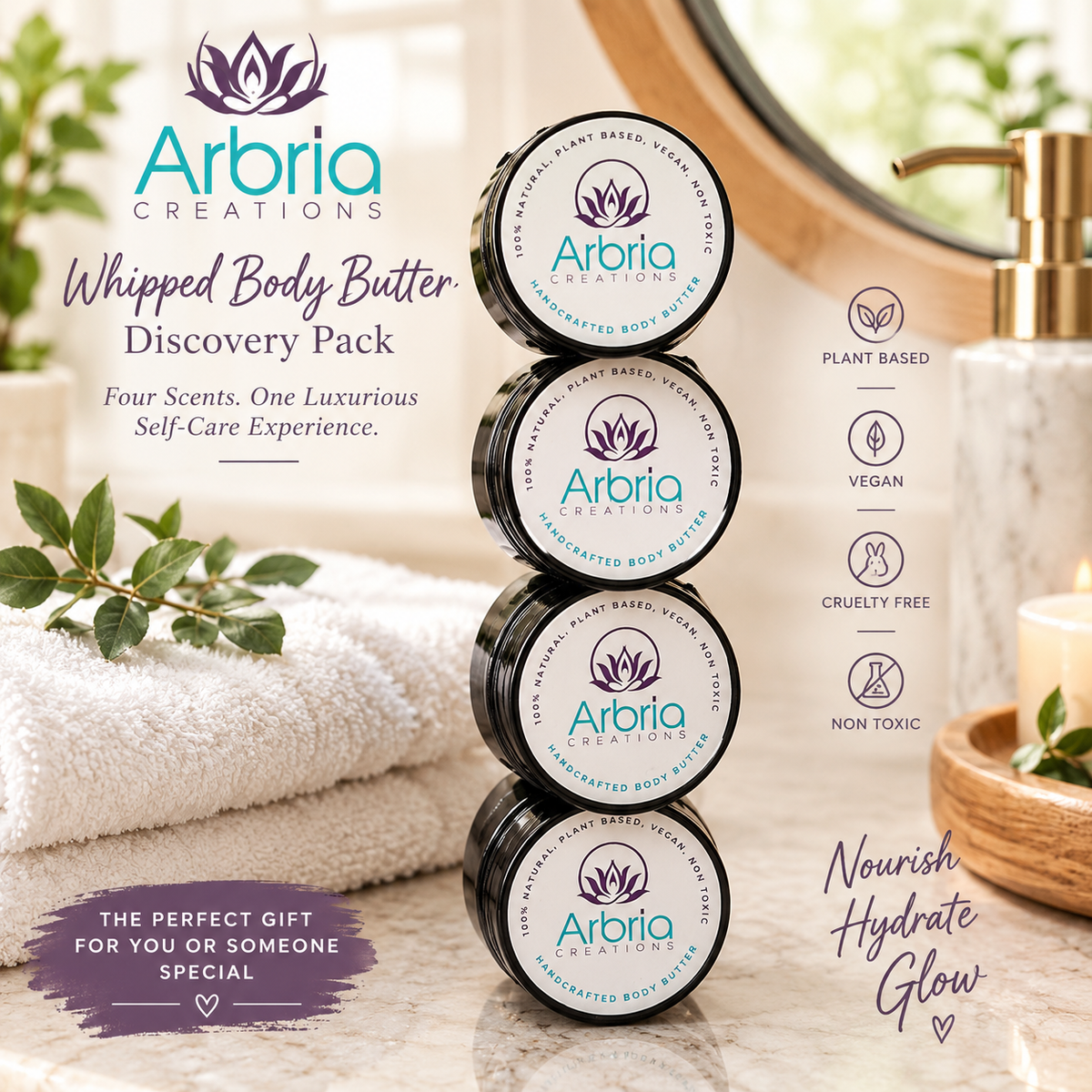 Arbria Creations Whipped Body Butter Discovery Pack featuring four stacked 2 oz mini body butter jars on a bathroom vanity