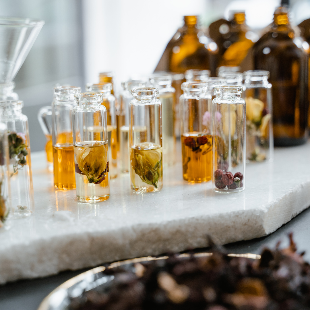 Custom perfume oil blending station with fragrance bottles